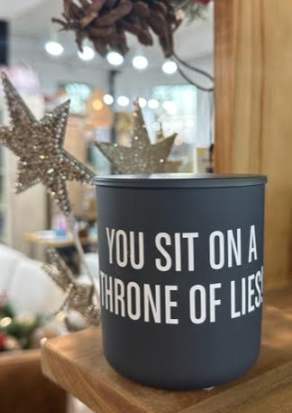 Holiday Movie Quote Candle "You Sit on a Throne of Lies"
